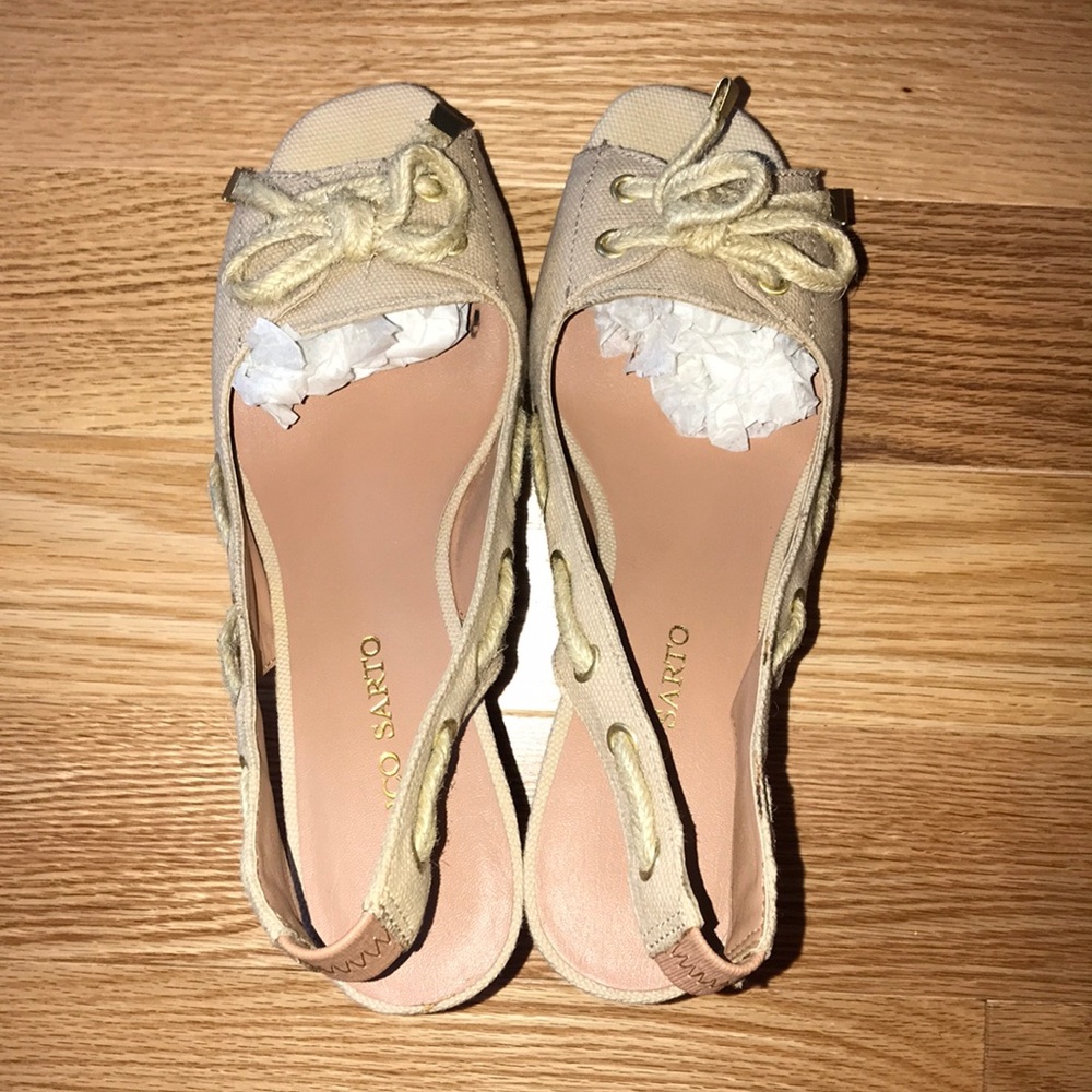 NIB women’s wedges with open heel.